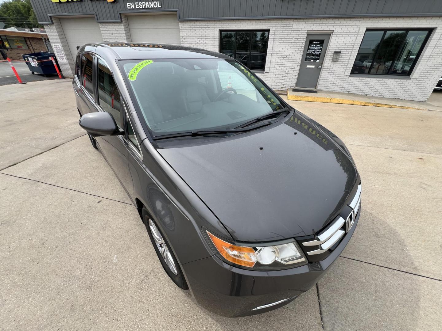 2016 Lunar Silver Metallic /Gray, Leather Honda Odyssey EX-L (5FNRL5H61GB) with an 3.5L V6 SOHC 24V engine, 6A transmission, located at 104 1st Avenue, Silvis, IL, 61282, (309) 755-9511, 41.515156, -90.425377 - Photo#1