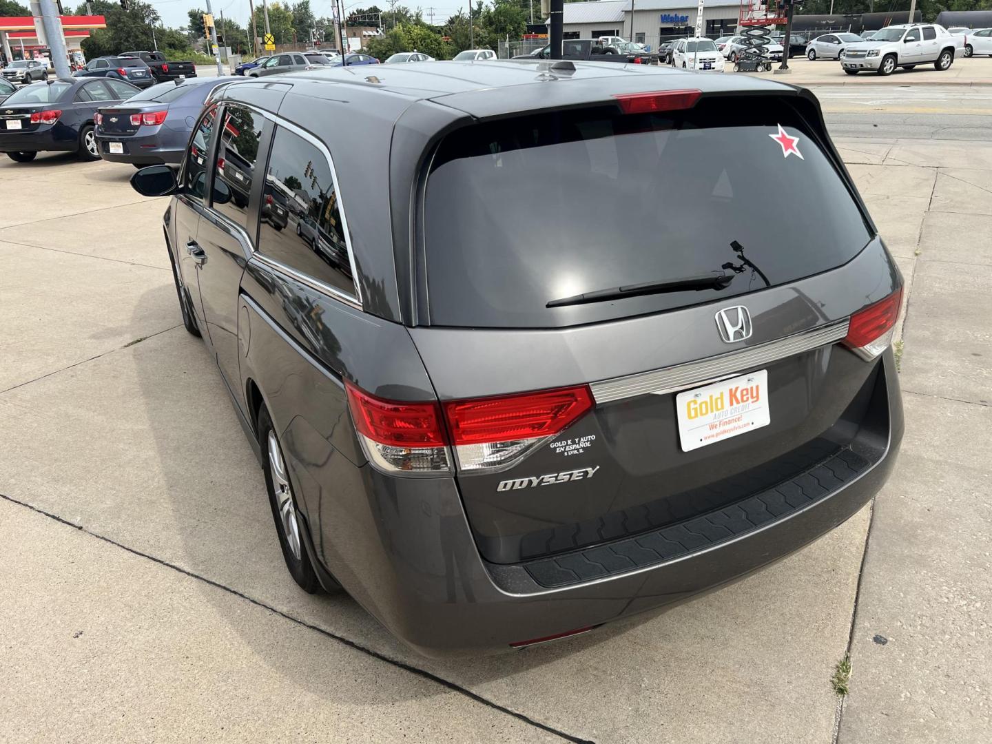 2016 Lunar Silver Metallic /Gray, Leather Honda Odyssey EX-L (5FNRL5H61GB) with an 3.5L V6 SOHC 24V engine, 6A transmission, located at 104 1st Avenue, Silvis, IL, 61282, (309) 755-9511, 41.515156, -90.425377 - Photo#2