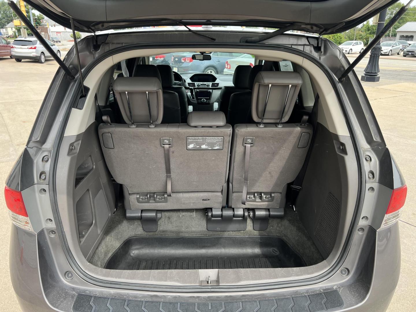 2016 Lunar Silver Metallic /Gray, Leather Honda Odyssey EX-L (5FNRL5H61GB) with an 3.5L V6 SOHC 24V engine, 6A transmission, located at 104 1st Avenue, Silvis, IL, 61282, (309) 755-9511, 41.515156, -90.425377 - Photo#7