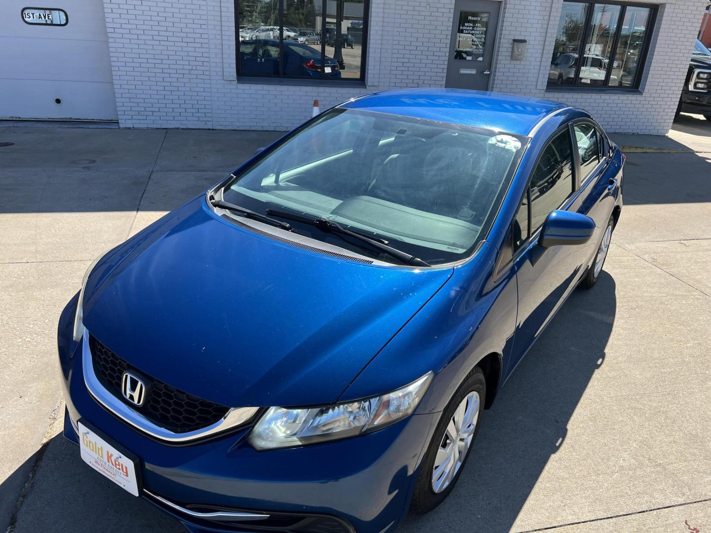 2015 Dyno Blue Pearl /Black, Cloth Honda Civic LX Sedan CVT (2HGFB2F50FH) with an 1.8L L4 SOHC 16V engine, Continuously Variable Transmission transmission, located at 104 1st Avenue, Silvis, IL, 61282, (309) 755-9511, 41.515156, -90.425377 - Photo#1