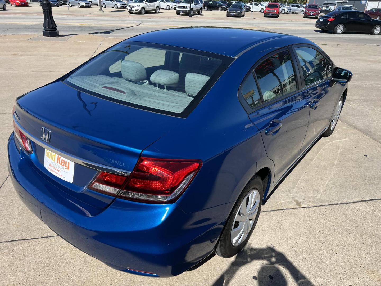 2015 Dyno Blue Pearl /Black, Cloth Honda Civic LX Sedan CVT (2HGFB2F50FH) with an 1.8L L4 SOHC 16V engine, Continuously Variable Transmission transmission, located at 104 1st Avenue, Silvis, IL, 61282, (309) 755-9511, 41.515156, -90.425377 - Photo#2