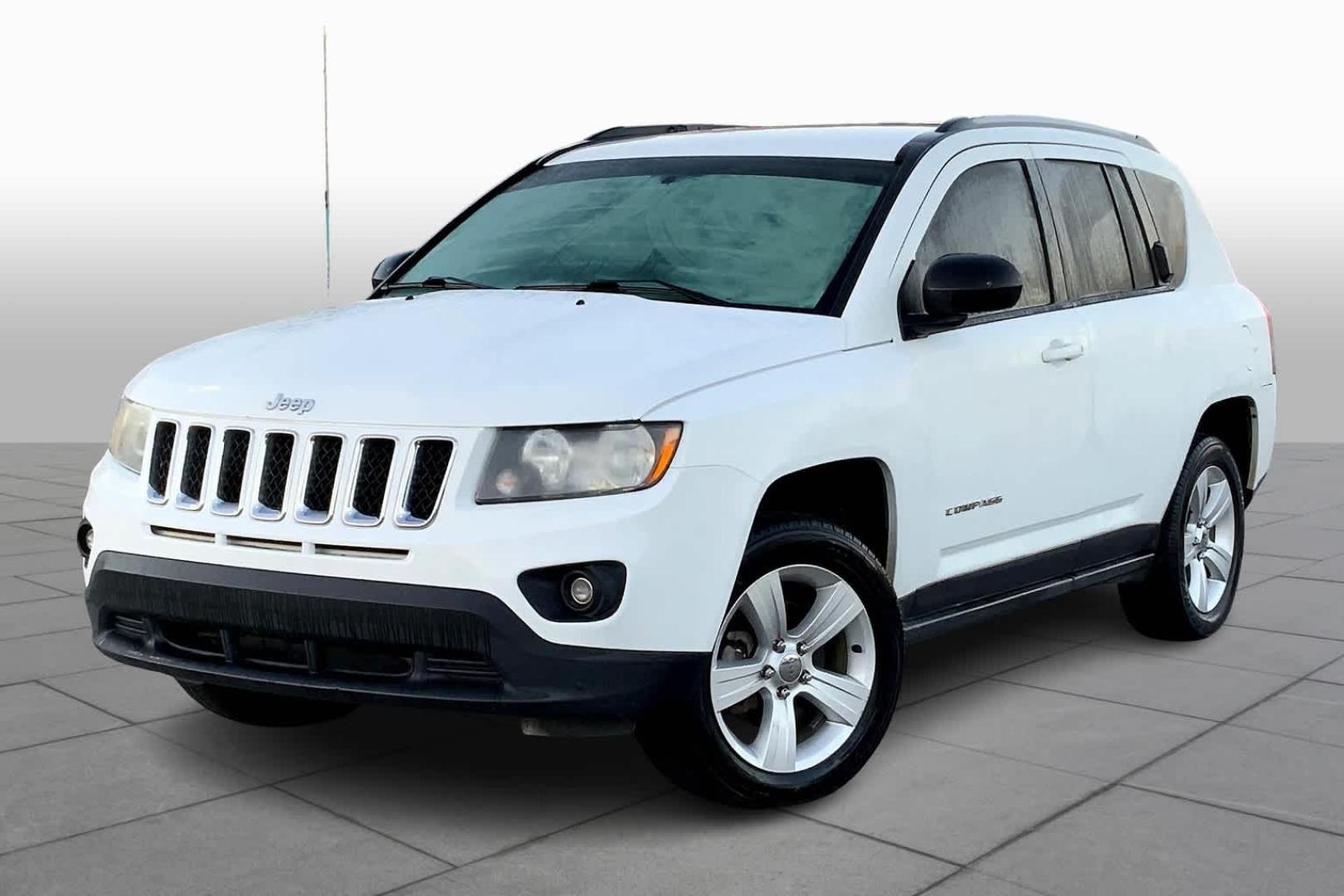 2016 White /Dark Slate Gray, Premium Cloth Jeep Compass Sport 4WD (1C4NJDBB9GD) with an 2.4L L4 DOHC 16V engine, located at 104 1st Avenue, Silvis, IL, 61282, (309) 755-9511, 41.515156, -90.425377 - Photo#0