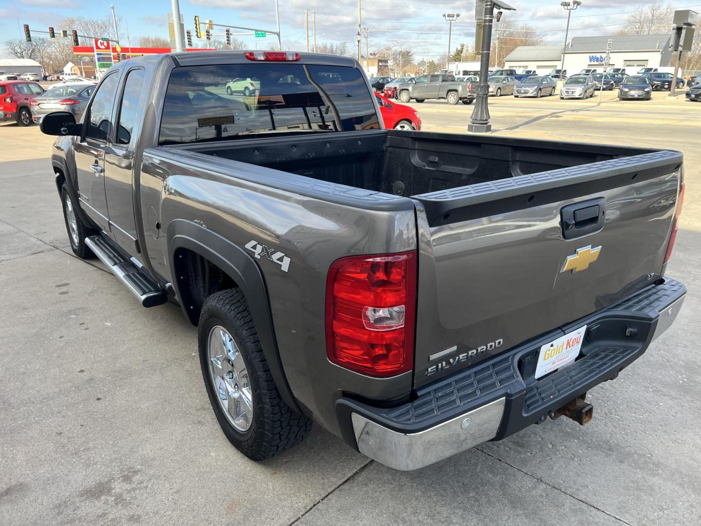 2012 Blue Granite Metallic /Ebony Cloth Interior Chevrolet Silverado 1500 LT Ext. Cab Long Box 4WD (1GCRKSE79CZ) with an 5.3L V8 OHV 16V FFV engine, 6-Speed Automatic transmission, located at 104 1st Avenue, Silvis, IL, 61282, (309) 755-9511, 41.515156, -90.425377 - Photo#1