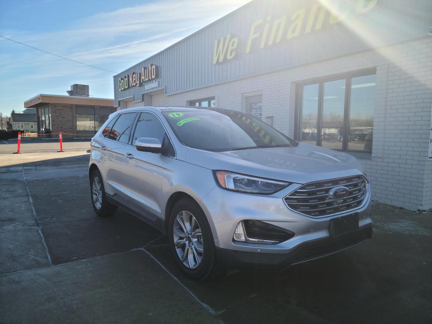 2019 Silver Ford Edge Titanium AWD (2FMPK4K91KB) with an 2.0L L4 DOHC 16V engine, 6A transmission, located at 104 1st Avenue, Silvis, IL, 61282, (309) 755-9511, 41.515156, -90.425377 - Photo#0