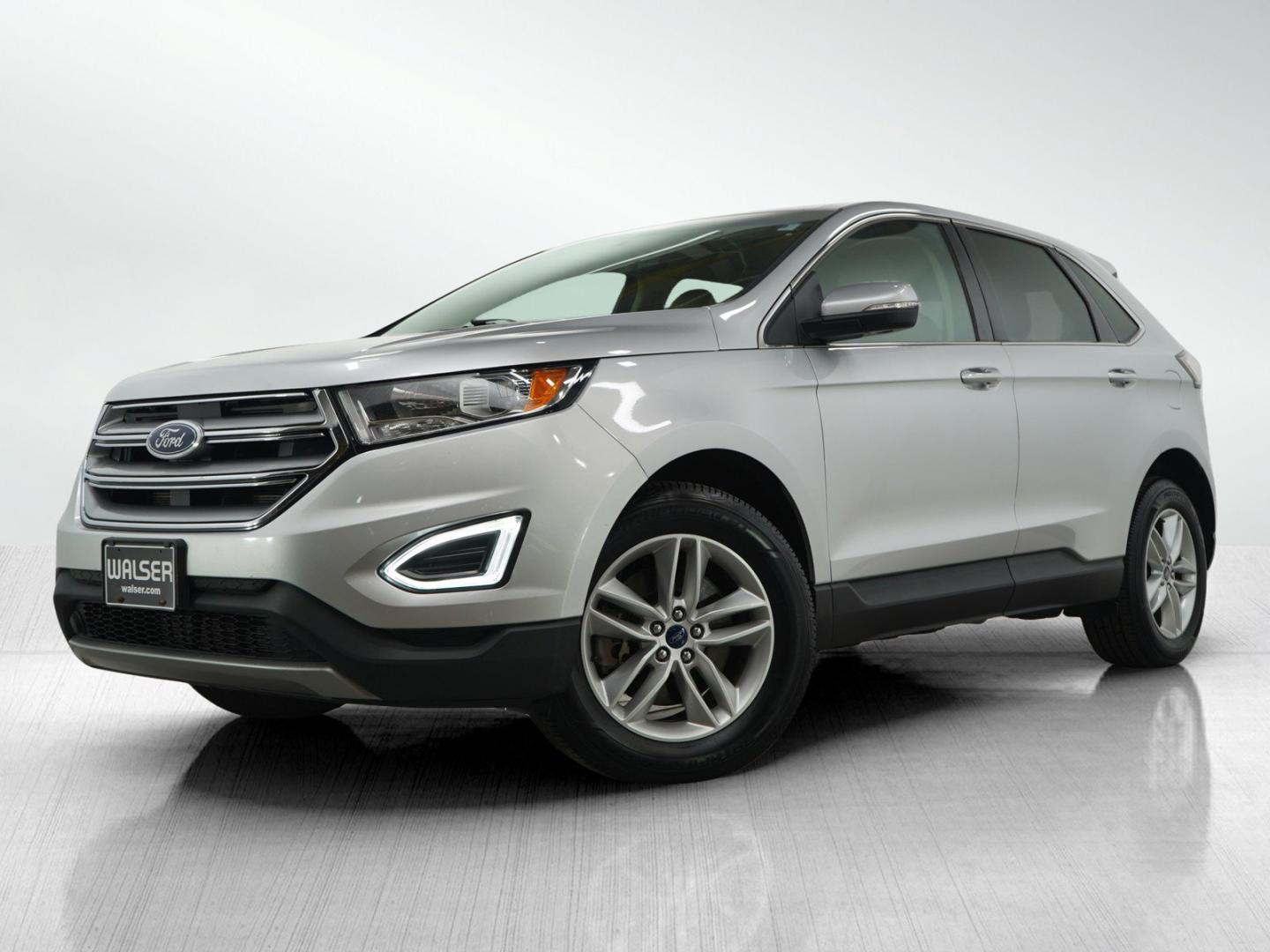 2016 Gray Ford Edge Titanium AWD (2FMPK4K87GB) with an 3.5L V6 DOHC 24V engine, 6A transmission, located at 104 1st Avenue, Silvis, IL, 61282, (309) 755-9511, 41.515156, -90.425377 - Photo#0