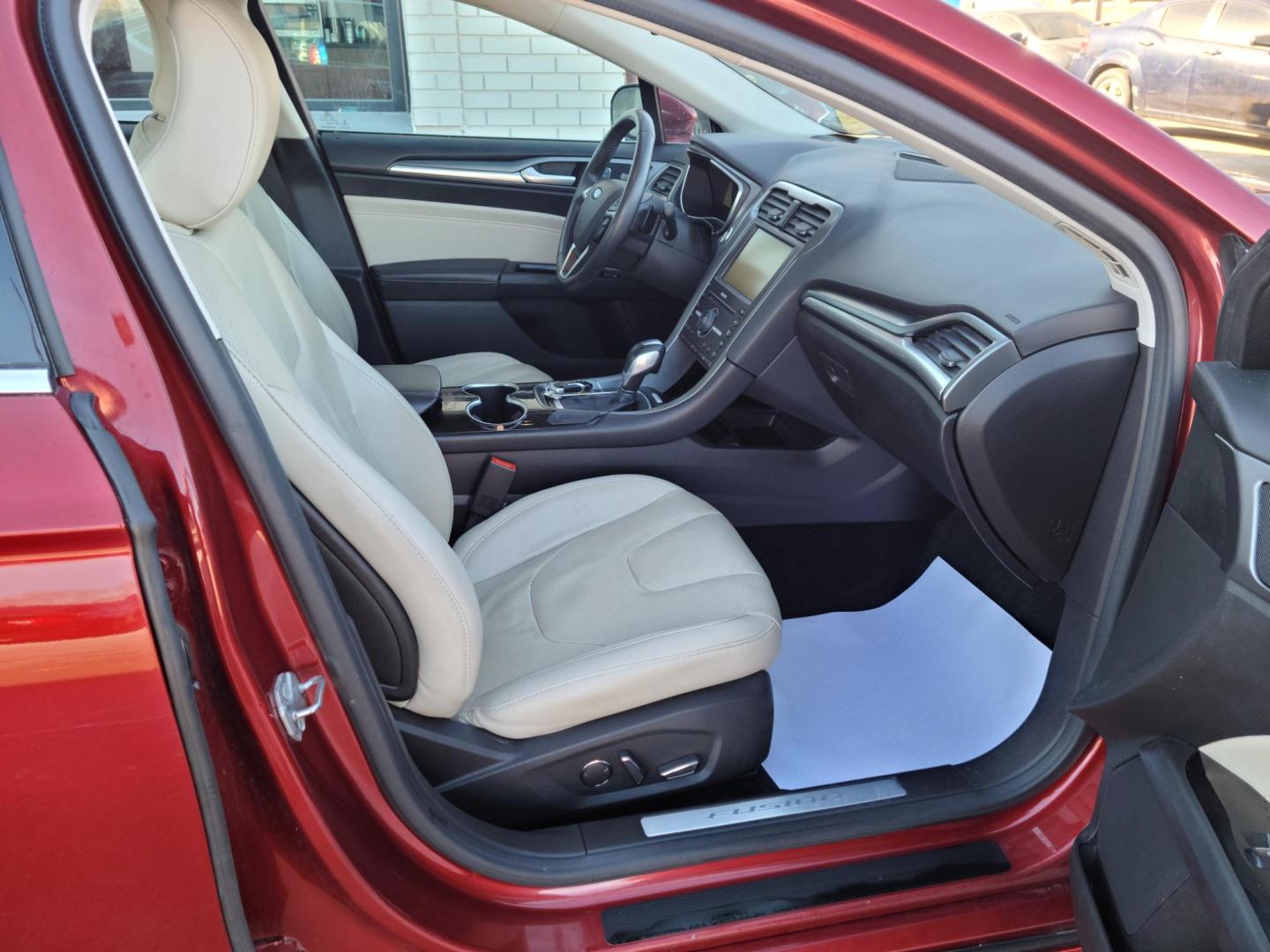 2016 Ruby Red Metallic Tinted Clearcoat /Charcoal Black, Leather Ford Fusion Titanium AWD (3FA6P0D98GR) with an 2.0L L4 DOHC 16V engine, 6A transmission, located at 104 1st Avenue, Silvis, IL, 61282, (309) 755-9511, 41.515156, -90.425377 - Photo#3