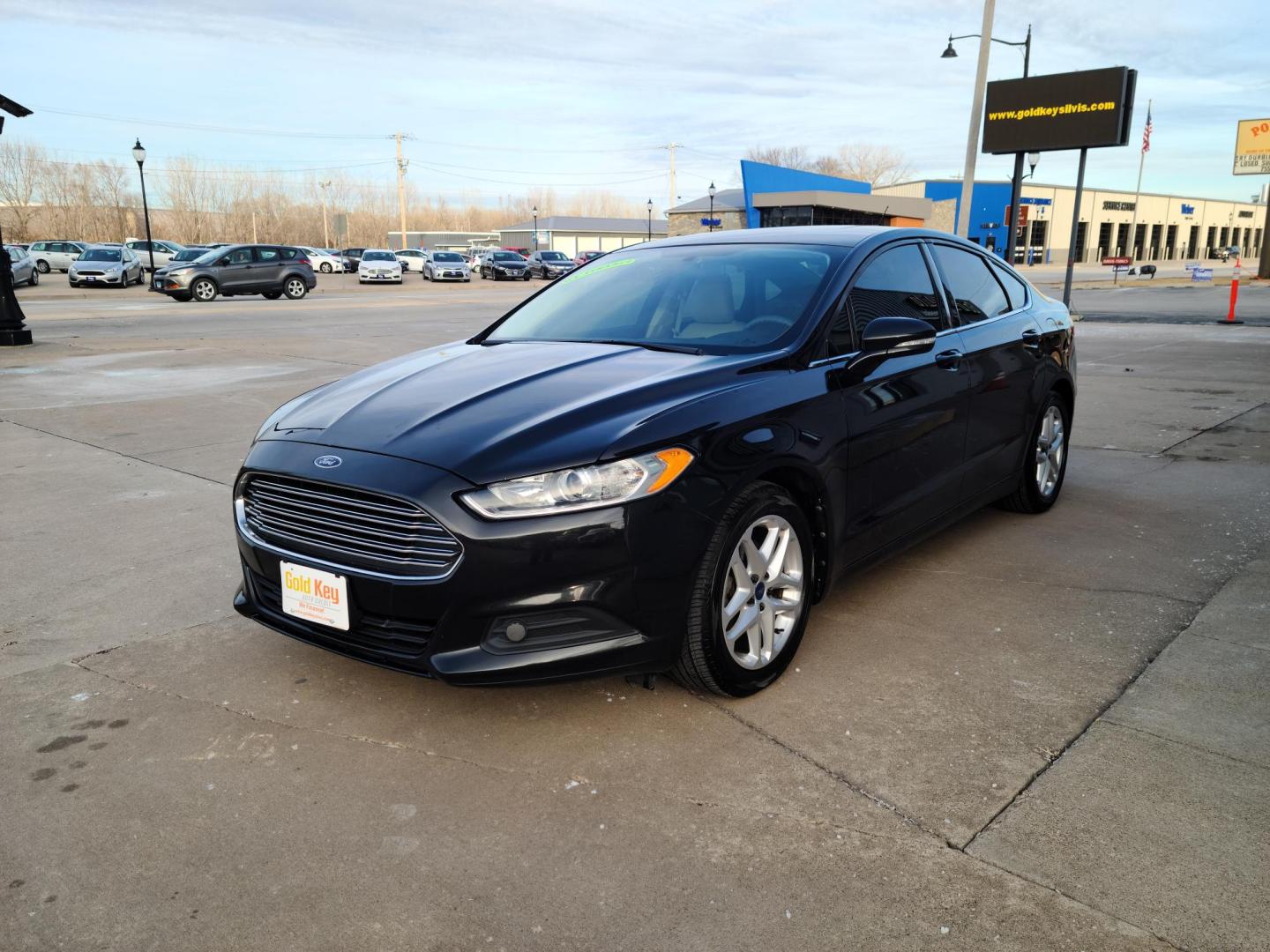 2013 Black /Tan Ford Fusion SE (3FA6P0H72DR) with an 2.5L L4 DOHC 16V engine, located at 104 1st Avenue, Silvis, IL, 61282, (309) 755-9511, 41.515156, -90.425377 - Photo#1