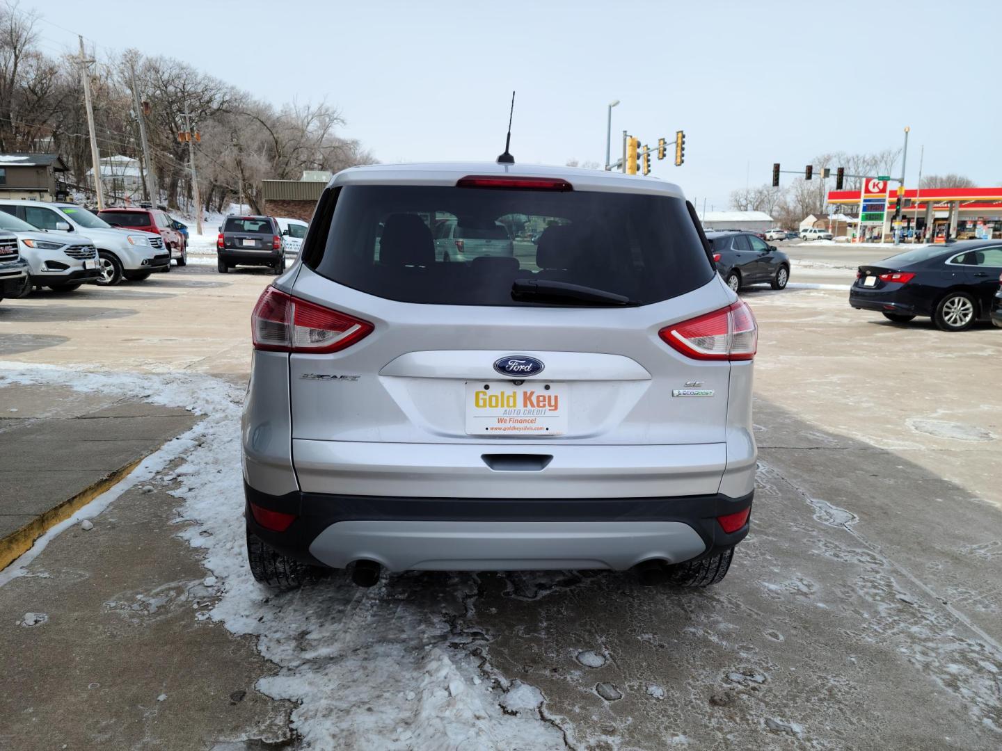 2014 Silver Ford Escape SE FWD (1FMCU0GX1EU) with an 1.6L L4 DOHC 16V engine, 6-Speed Automatic transmission, located at 104 1st Avenue, Silvis, IL, 61282, (309) 755-9511, 41.515156, -90.425377 - Photo#5