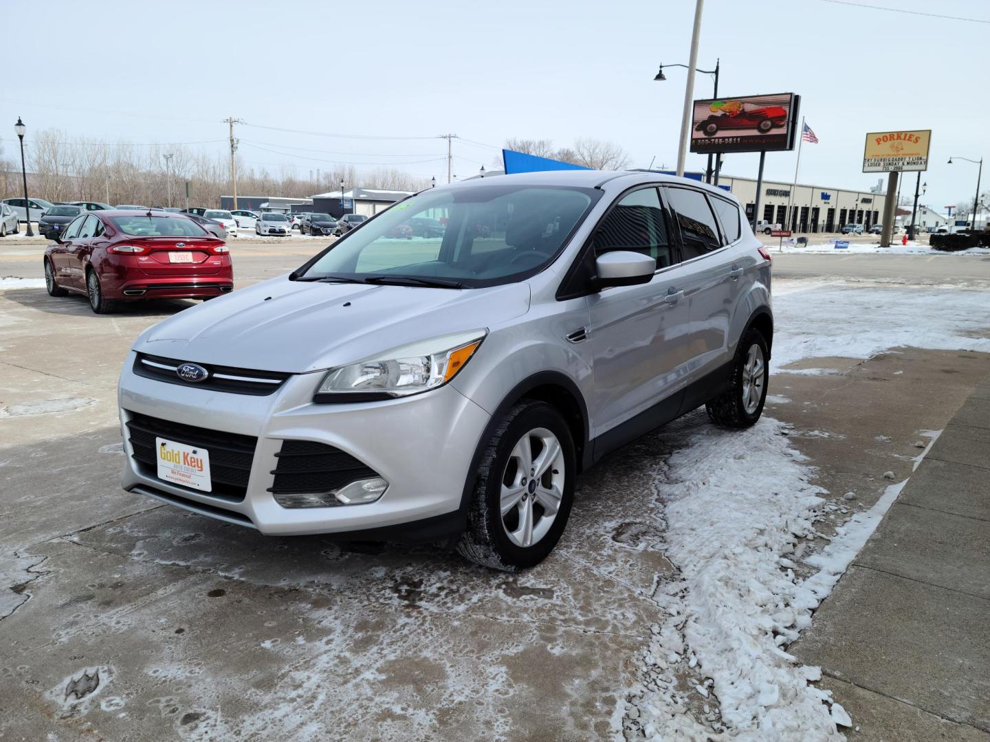 2014 Silver Ford Escape SE FWD (1FMCU0GX1EU) with an 1.6L L4 DOHC 16V engine, 6-Speed Automatic transmission, located at 104 1st Avenue, Silvis, IL, 61282, (309) 755-9511, 41.515156, -90.425377 - Photo#1