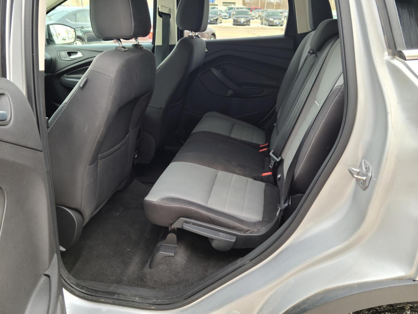 2014 Silver Ford Escape SE FWD (1FMCU0GX1EU) with an 1.6L L4 DOHC 16V engine, 6-Speed Automatic transmission, located at 104 1st Avenue, Silvis, IL, 61282, (309) 755-9511, 41.515156, -90.425377 - Photo#2