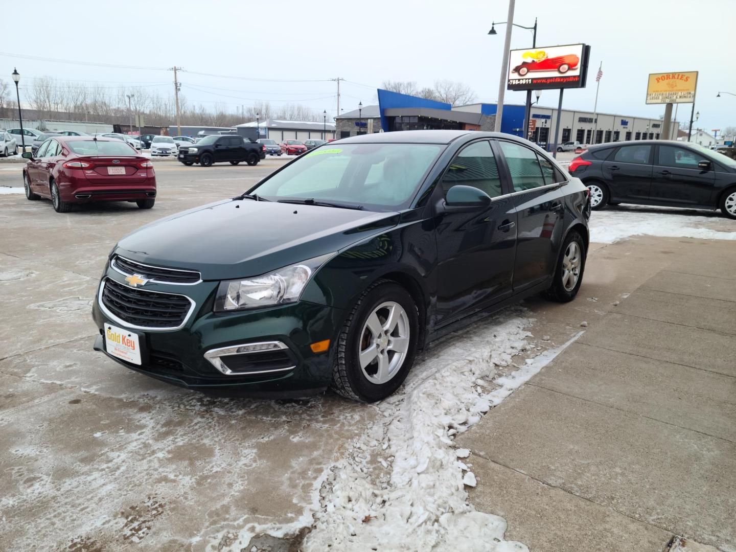 2015 Chevrolet Cruze 1LT Auto (1G1PC5SB9F7) with an 1.4L L4 DOHC 16V TURBO engine, 6-Speed Automatic transmission, located at 104 1st Avenue, Silvis, IL, 61282, (309) 755-9511, 41.515156, -90.425377 - Photo#0