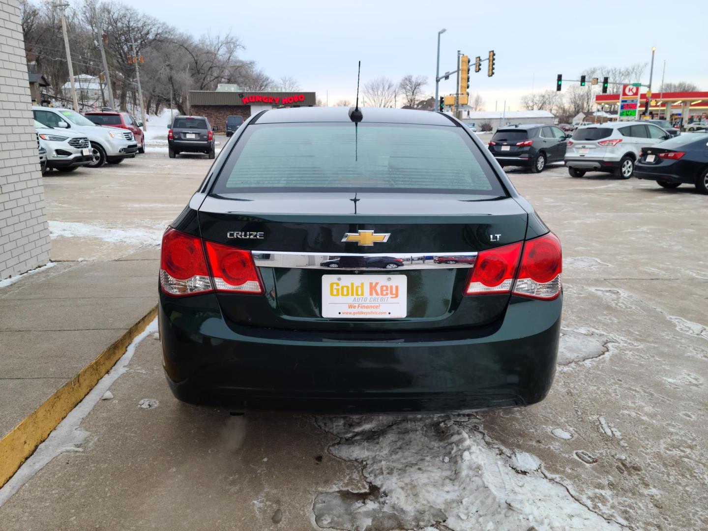 2015 Chevrolet Cruze 1LT Auto (1G1PC5SB9F7) with an 1.4L L4 DOHC 16V TURBO engine, 6-Speed Automatic transmission, located at 104 1st Avenue, Silvis, IL, 61282, (309) 755-9511, 41.515156, -90.425377 - Photo#2